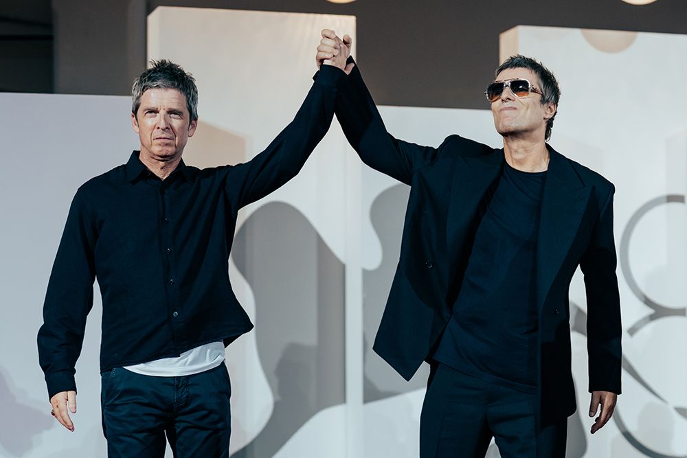 Featured image Gallagher raise fists electrify Venice for Oasis doc